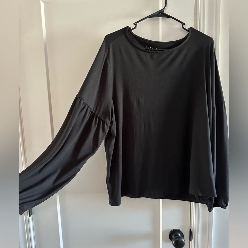Black long sleeve top with poofy sleeve detail. Size 1X Ava & Viv